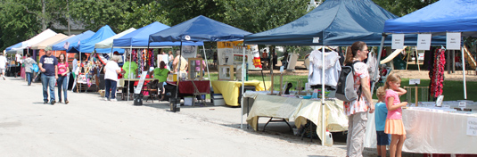 A row of vendors at the Summer's End festival