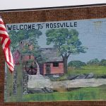 Welcome to Rossville mural on side of building next to American flag