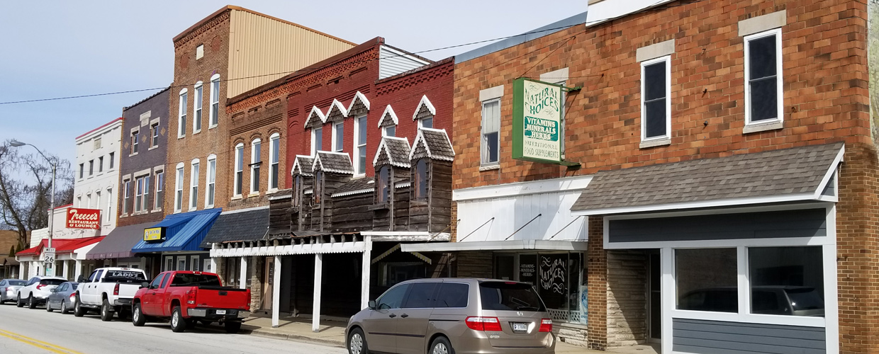 Main Street of Rossville showing multiple businesses along a busy street