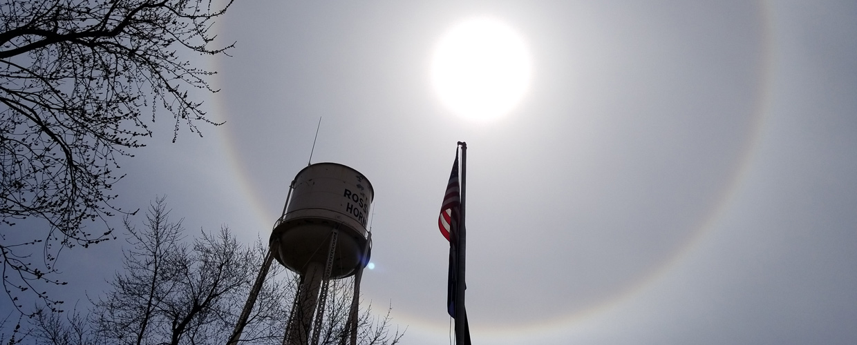 Rossville Water Tower & Flag with Sun Halo in the background
