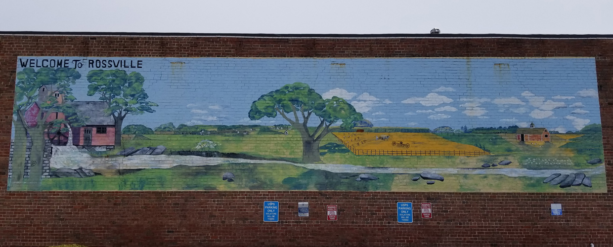 Welcome to Rossville Mural painted on the side of a brick building